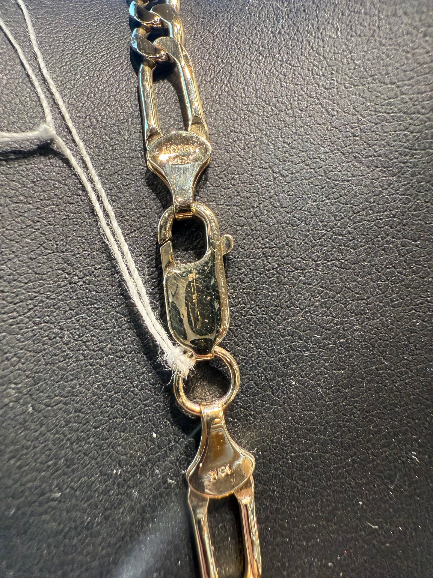 Gold figaro chain