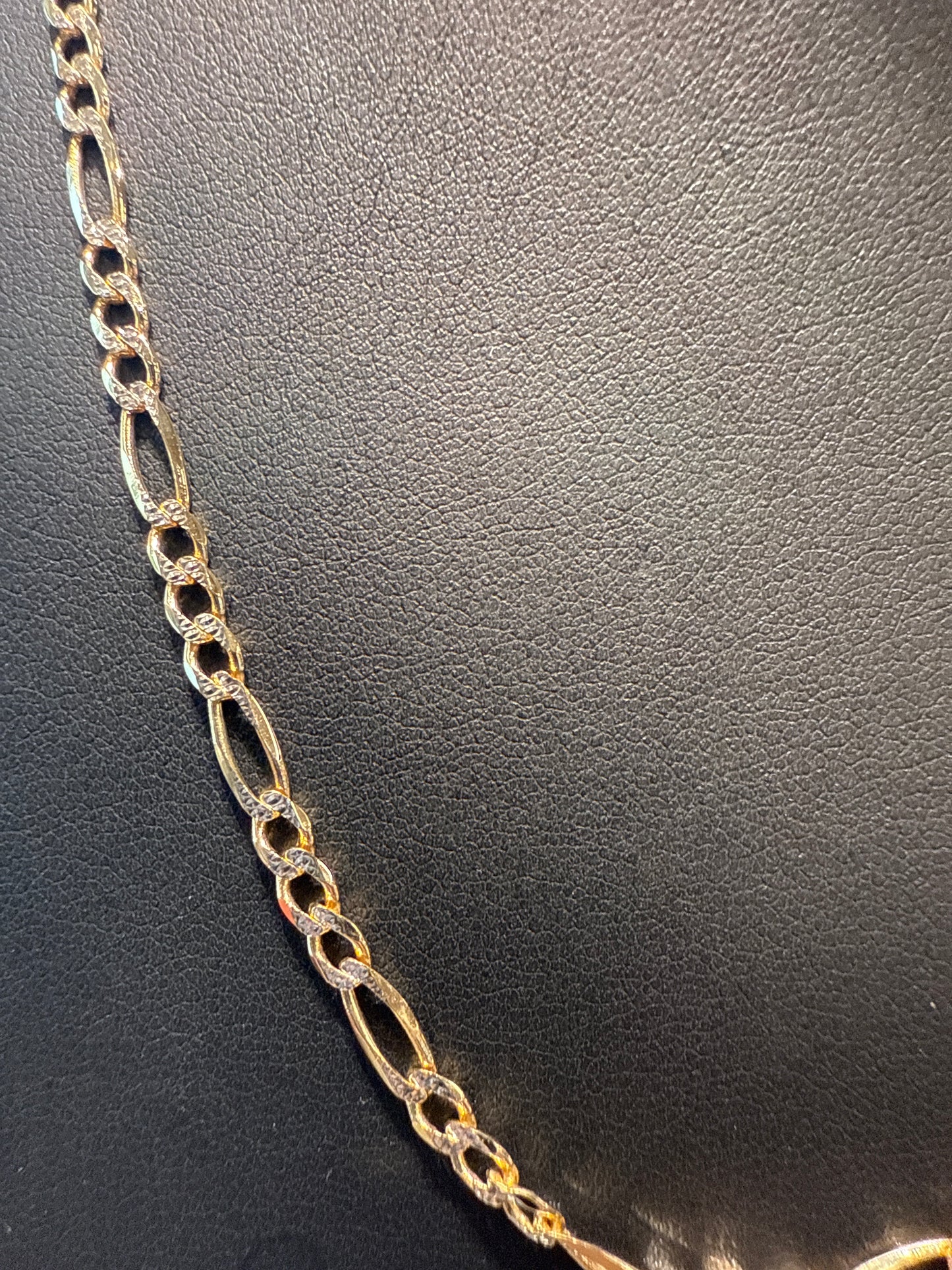 Gold figaro chain
