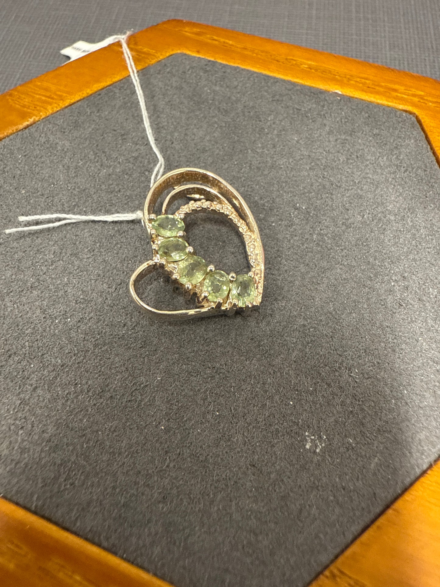 Silver heart charm