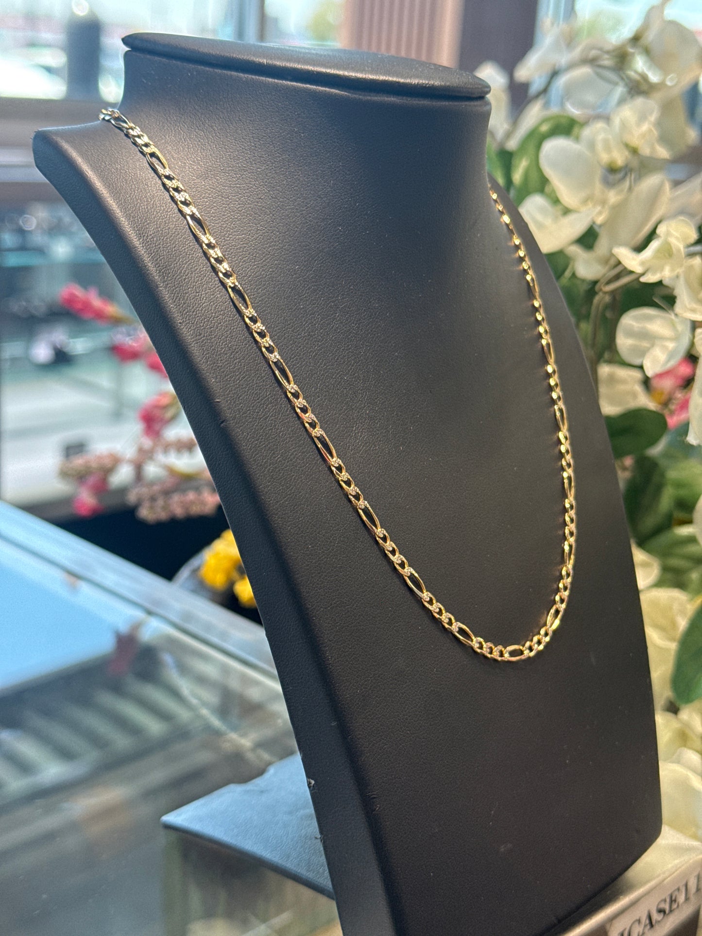 Gold figaro chain