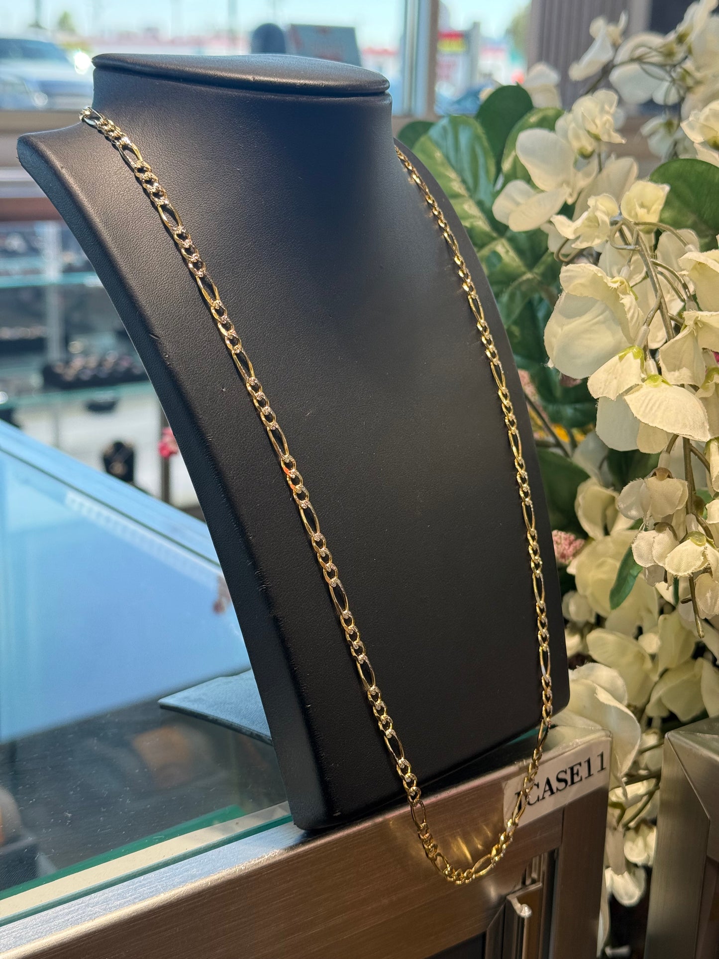 Gold figaro chain