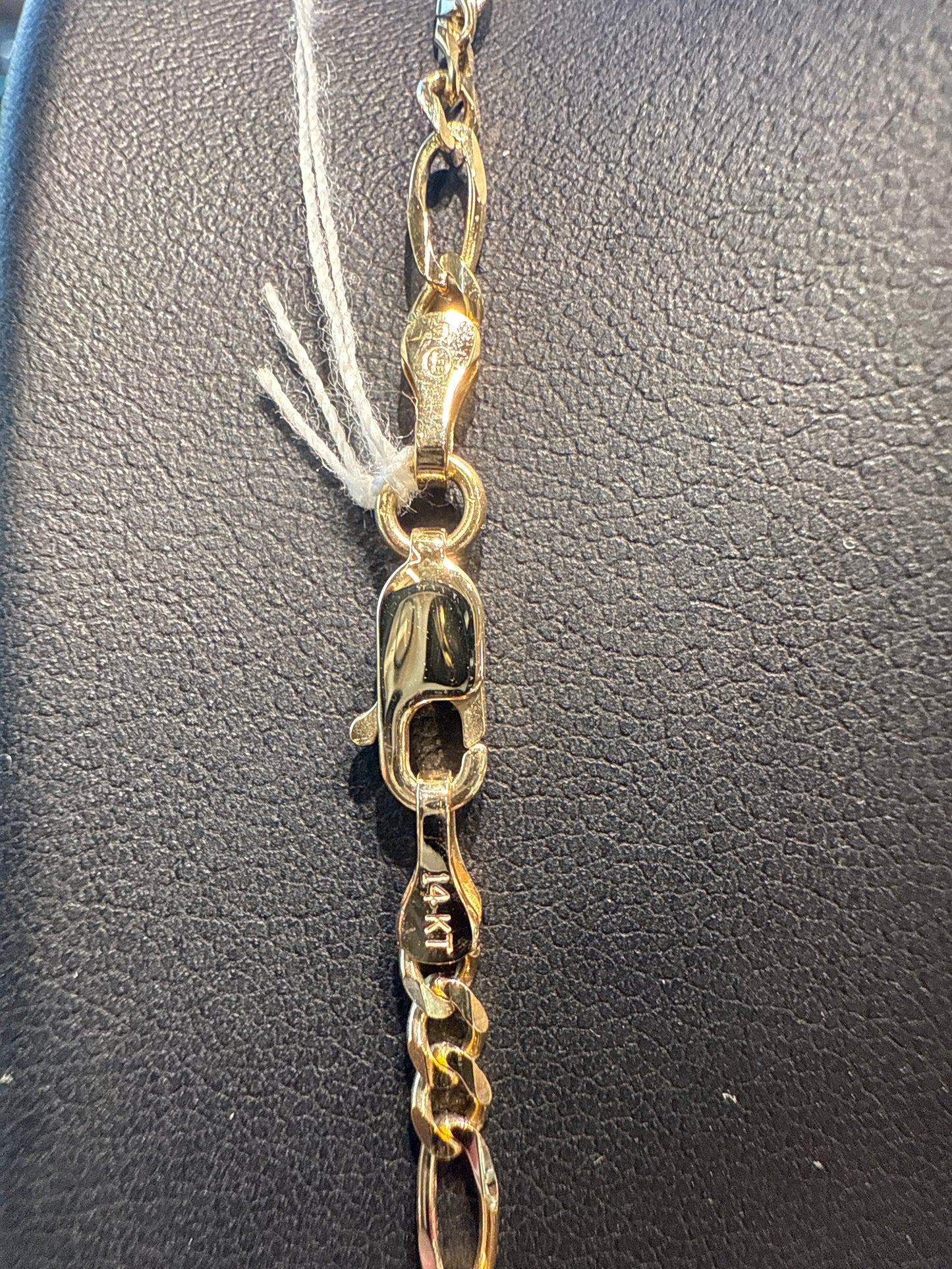 Gold figaro chain