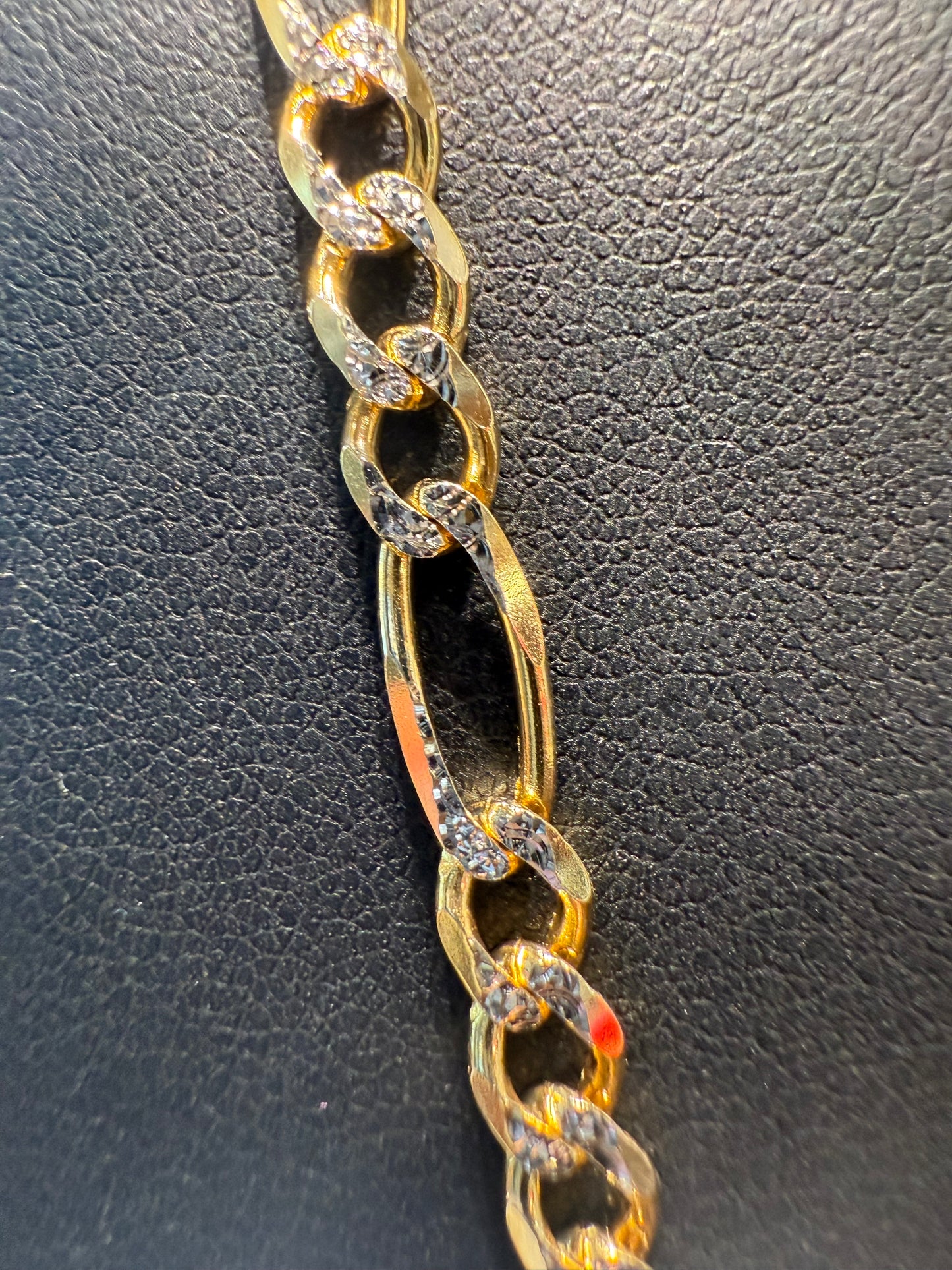 Gold figaro chain