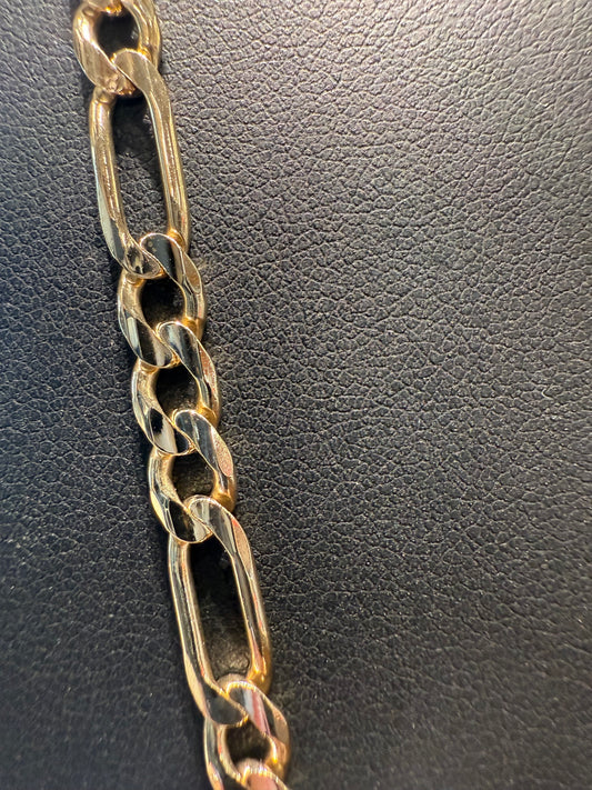 Gold figaro chain