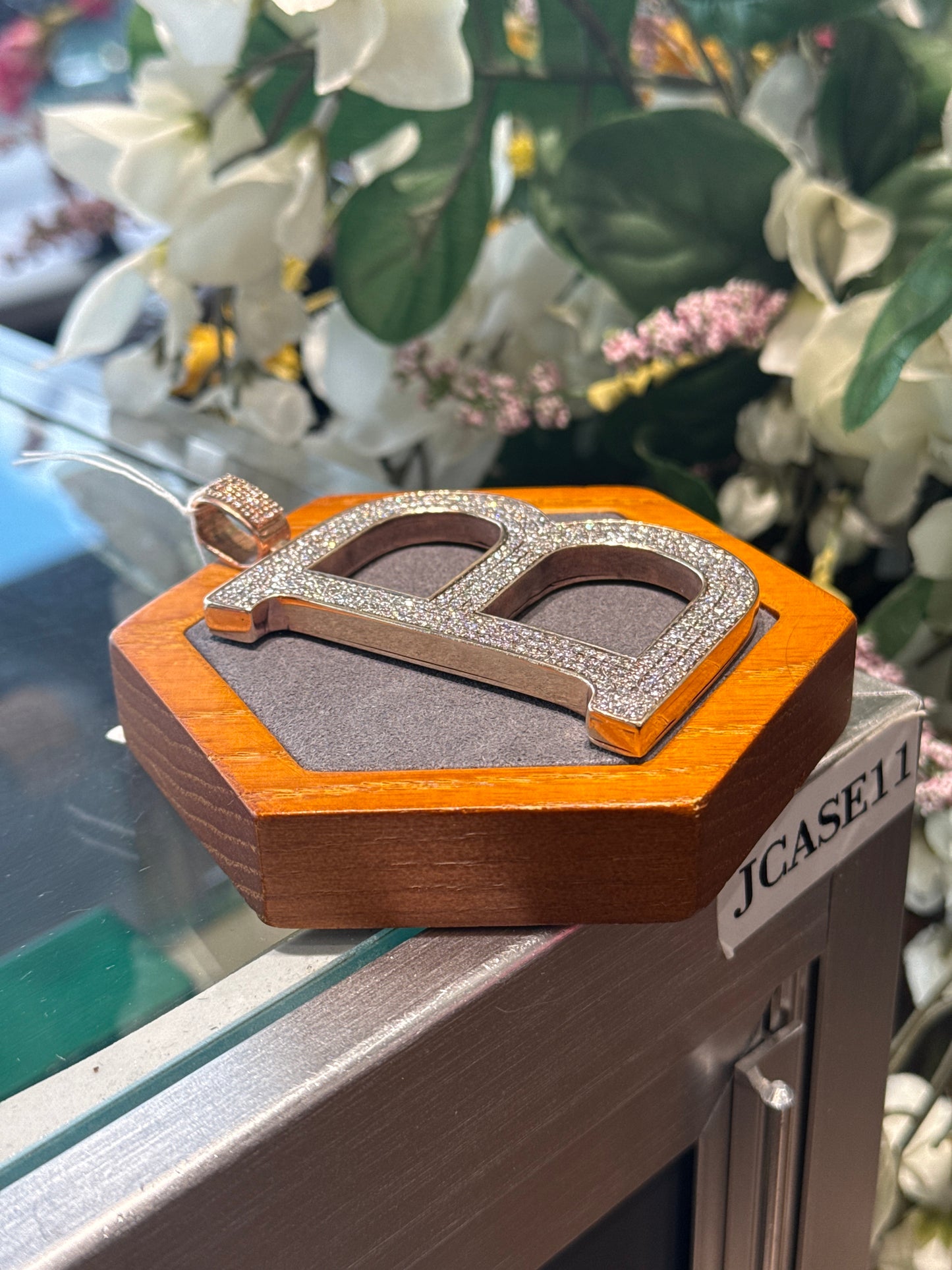 Gold “B” charm