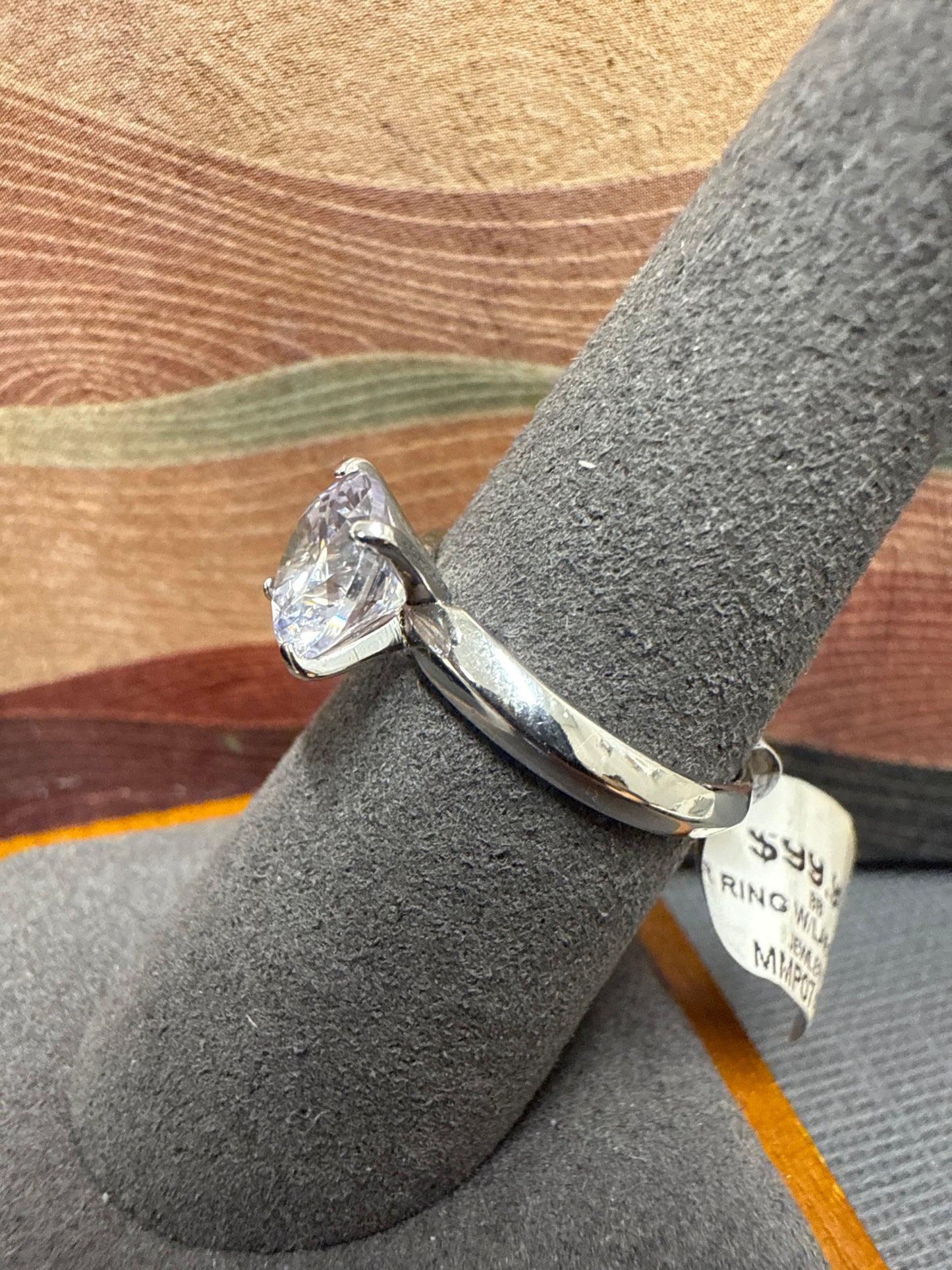 Silver solitaire ring