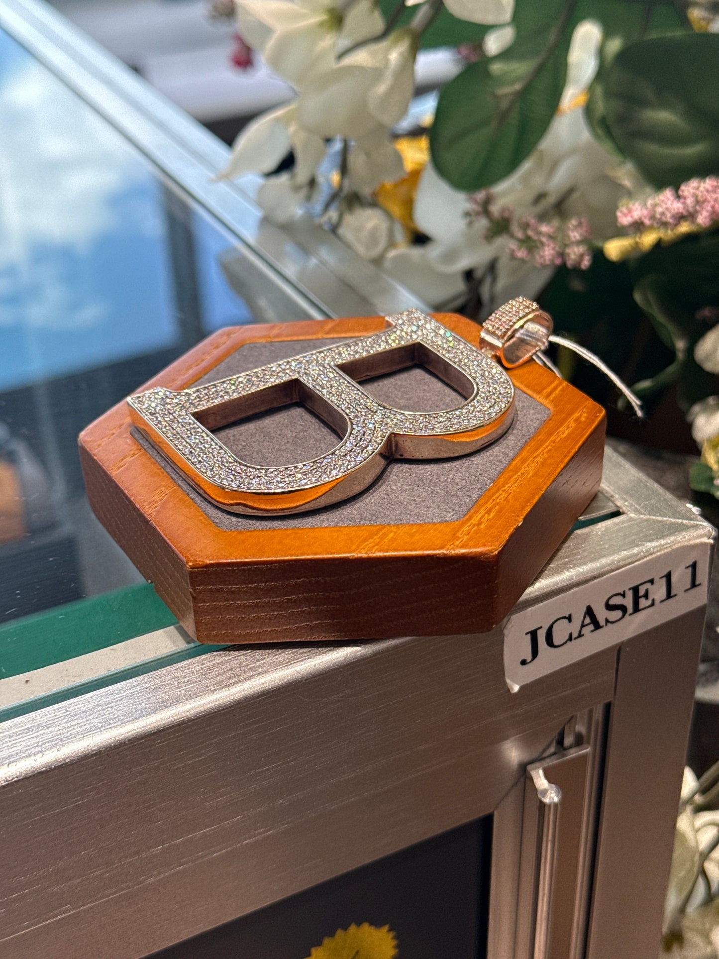 Gold “B” charm