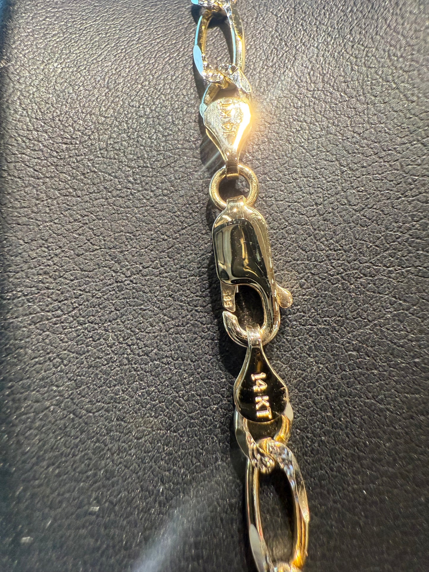 Gold figaro chain