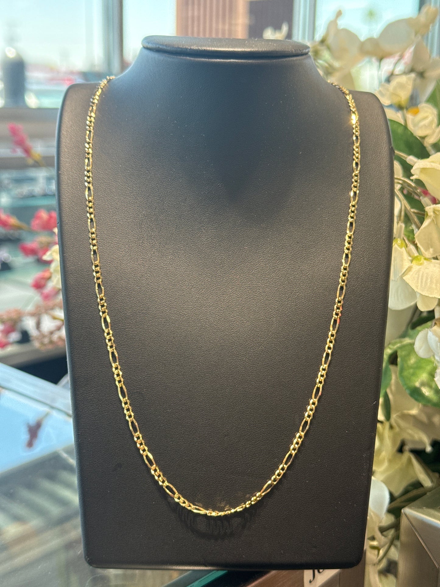 Gold figaro chain
