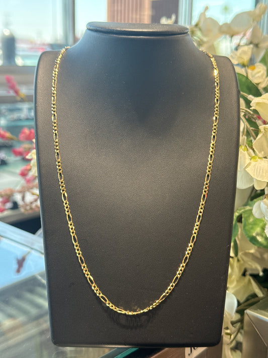 Gold figaro chain