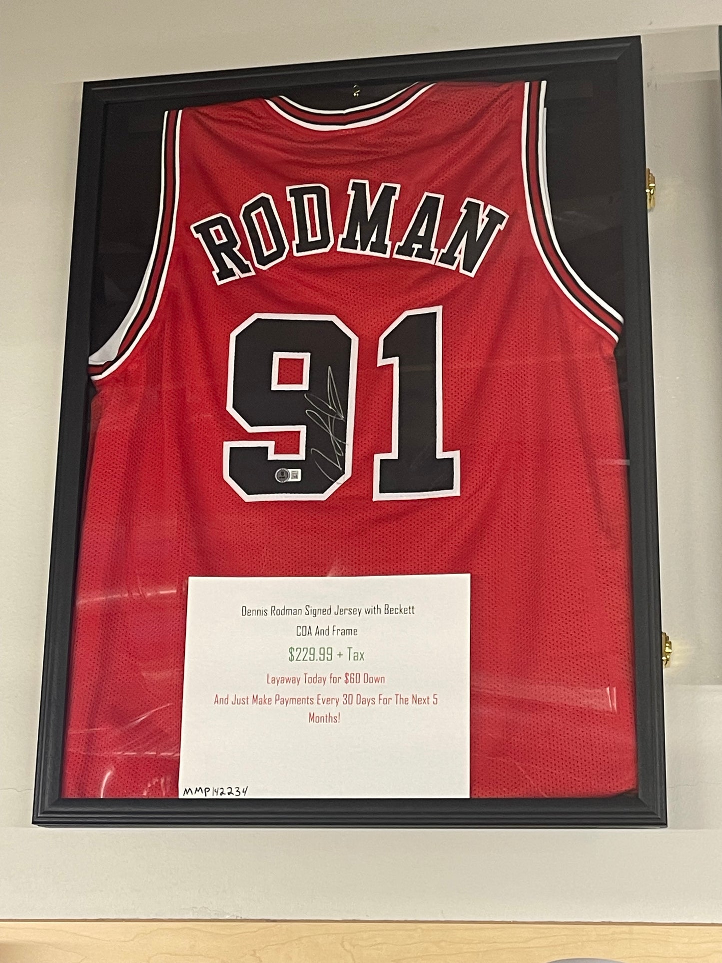 Framed Dennis Rodman signed jersey