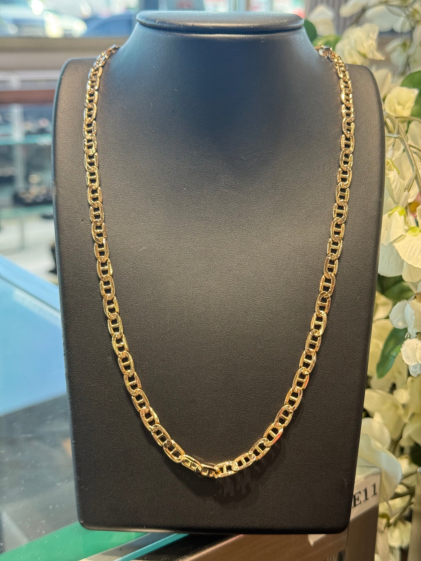 Gold Gucci chain