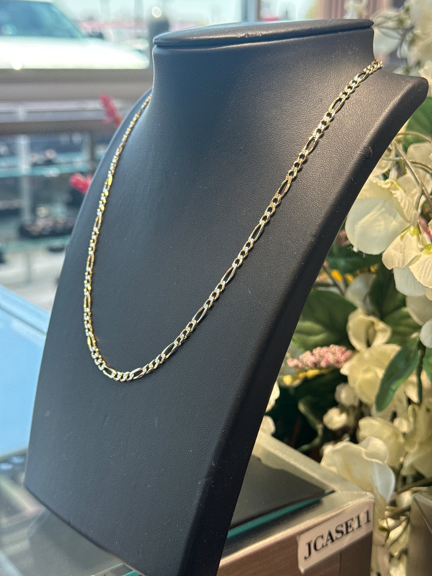 Gold figaro chain