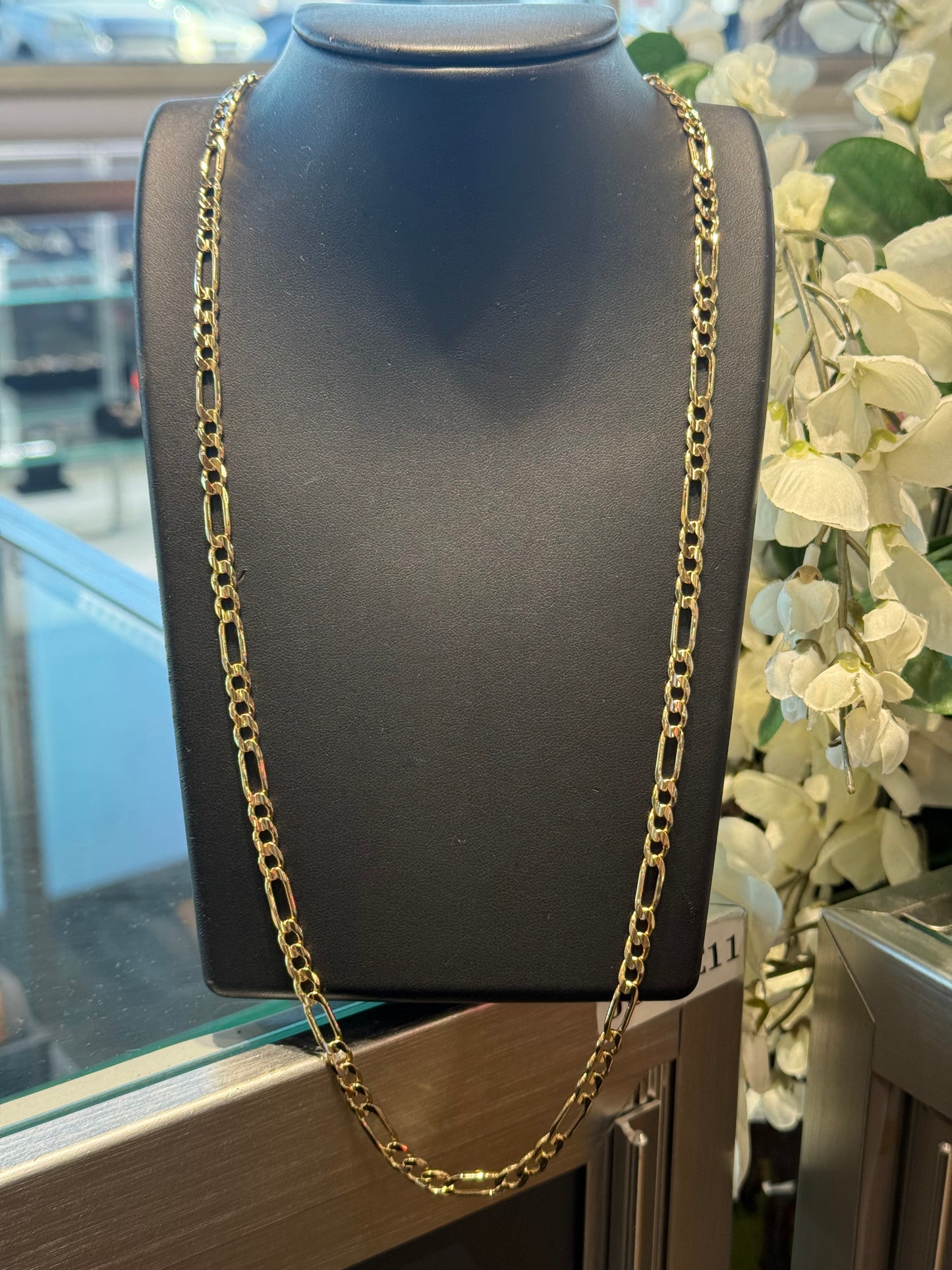 Gold figaro chain