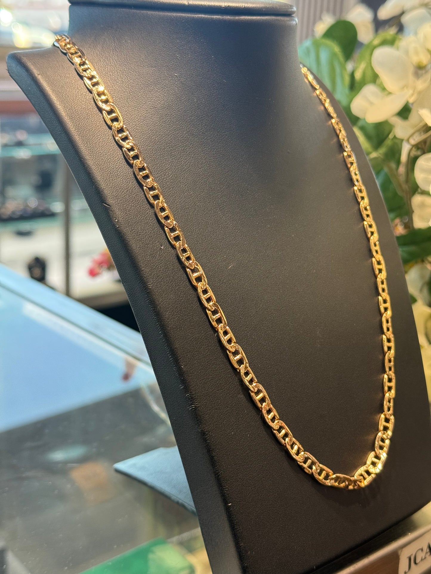 Gold Gucci chain