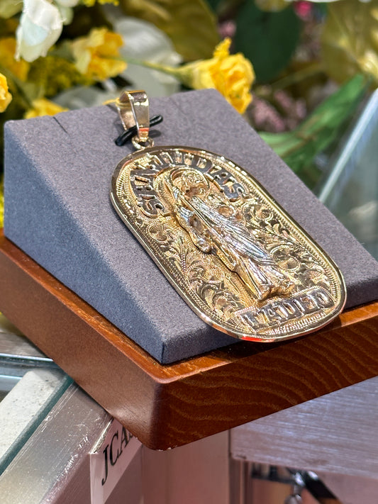 Gold religious pendant